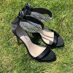 black nina heels with jeweled strap never been worn